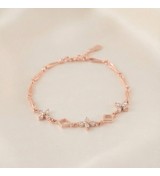 Blossom Charm Bracelet – Rose Gold Chain with Crystal and Geometric Accents