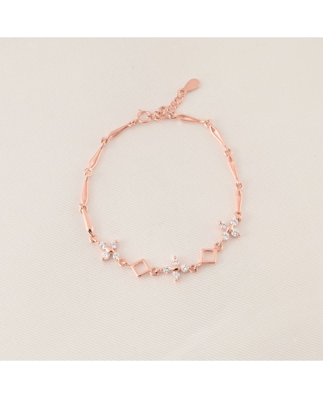 Blossom Charm Bracelet – Rose Gold Chain with Crystal and Geometric Accents